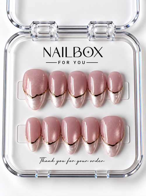 Blush Veil shimmering blush pink press-on nails with pearlescent pale pink French tips, soft swirled details, and thin gold-tone borders in a clear nail box.